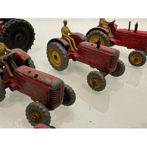 215 - Die cast toys, a collection of tractors and two model cannons. Dinky Corgi etc.

This lot is availab... 