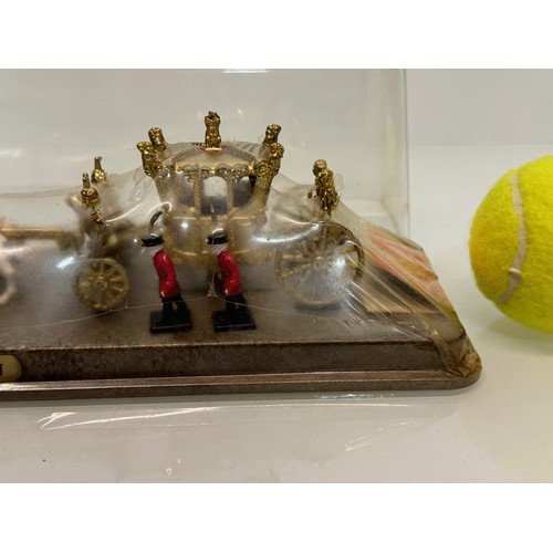 217 - A new old stock Royal Coronation coach model from Silver Jubilee year, 38 cm x 10 cm x 10 cm tall.

... 