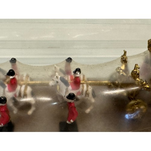 217 - A new old stock Royal Coronation coach model from Silver Jubilee year, 38 cm x 10 cm x 10 cm tall.

... 