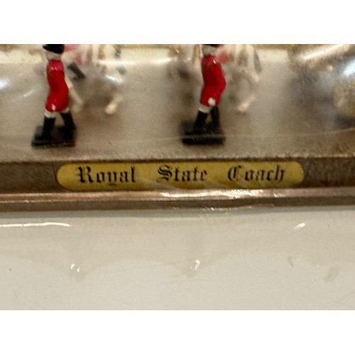 217 - A new old stock Royal Coronation coach model from Silver Jubilee year, 38 cm x 10 cm x 10 cm tall.

... 