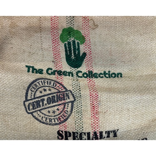 231 - Vintage hessian sack advertising The Green Collection Collumbian coffee, 73 cm x 63 cm.

This lot is... 