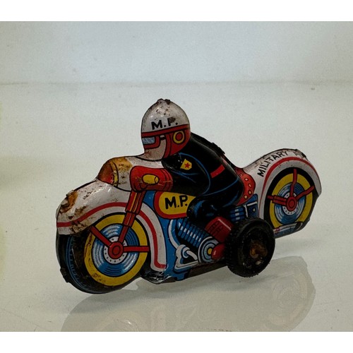 384 - Toys, lithographed tin plate toy Military Police Motorcyclist. 9 cm long.

This lot is available for... 