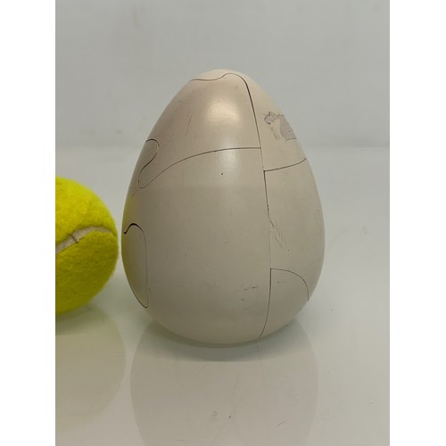 410 - Large wooden puzzle egg.

This lot is available for in-house shipping