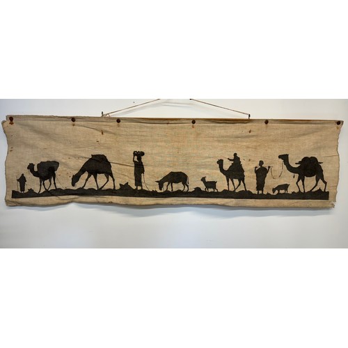 419 - Artwork, a Bedouin scene on linen, 109 cm x 27 cm.

This lot is available for in-house shipping