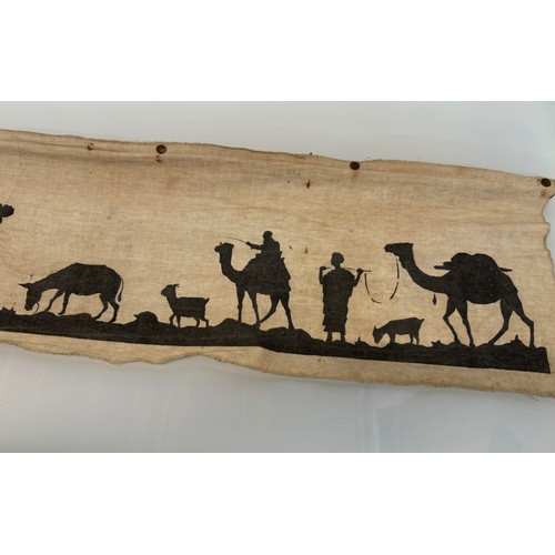 419 - Artwork, a Bedouin scene on linen, 109 cm x 27 cm.

This lot is available for in-house shipping