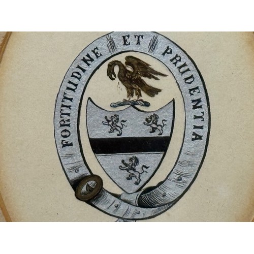 493 - Heraldic emblem, hand painted panel in a glazed frame.

This lot is available for in-house shipping