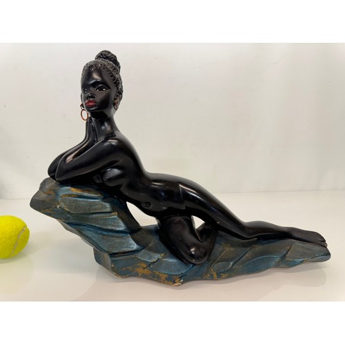 19 - Kitch painted chalk figure of a reclining female marked J.P. – M.D. 45 cm long.

This lot is availab... 