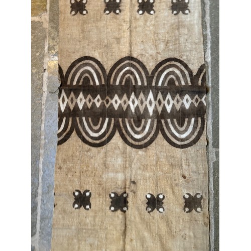 22 - African textile panel, again small sections joined then overprinted, 173.5 cm x 50.5 cm

This lot is... 