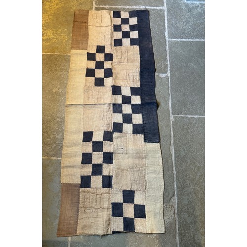 23 - African textile panel , small dyed sections joined to make a larger panel, 153 cm x 59 cm.

This lot... 