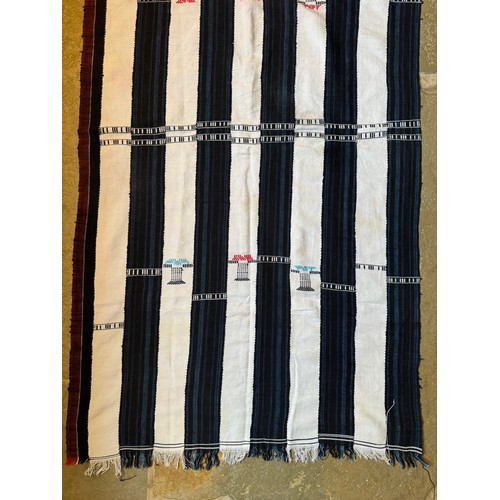 27 - African woven textile pre dyed sections making a larger panel with embroidered decorations, 123 cm x... 