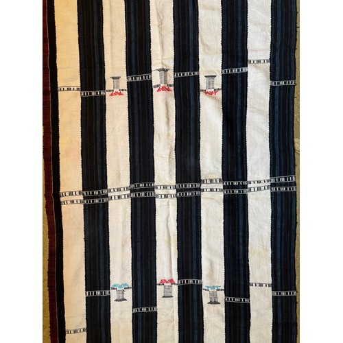 27 - African woven textile pre dyed sections making a larger panel with embroidered decorations, 123 cm x... 