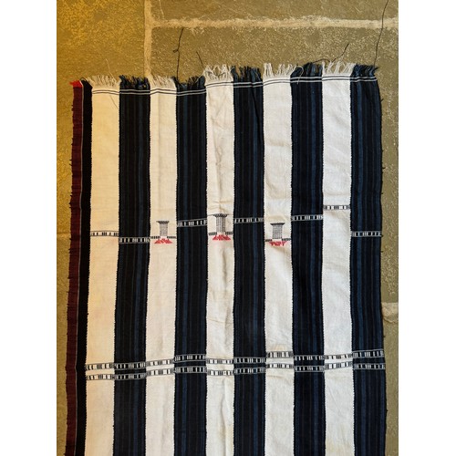 27 - African woven textile pre dyed sections making a larger panel with embroidered decorations, 123 cm x... 