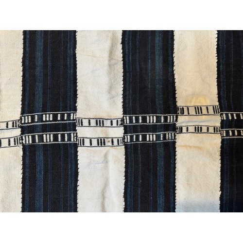 27 - African woven textile pre dyed sections making a larger panel with embroidered decorations, 123 cm x... 