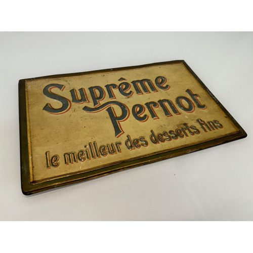 64 - Breweryana, an embossed and lithographed tin plate sign for Supreme Pernot, 43 cm x 28 cm.

This lot... 