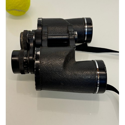 76 - A pair of Pentax binoculars.

This lot is available for in-house shipping