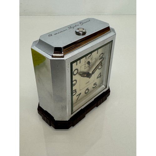 164 - Art Deco era bakelite and chrome cased alarm clock, 11 cm x 12 cm high.

This lot is available for i... 