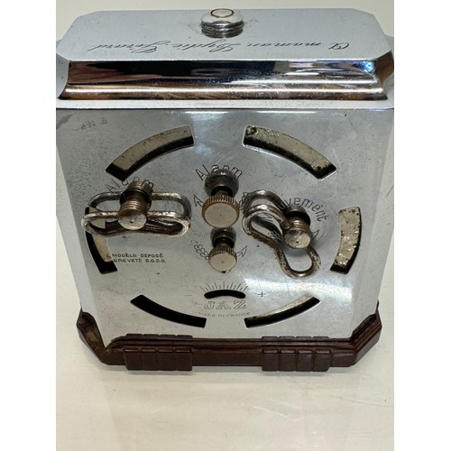 164 - Art Deco era bakelite and chrome cased alarm clock, 11 cm x 12 cm high.

This lot is available for i... 