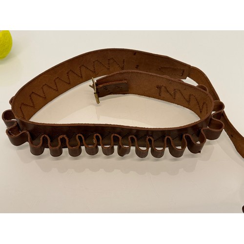 176 - Leather cartridge belt.

This lot is available for in-house shipping