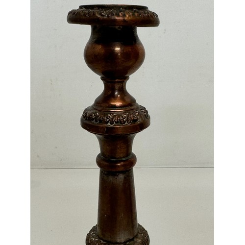 181 - A pair of cast copper candle stands, 25 cm tall.

This lot is available for in-house shipping