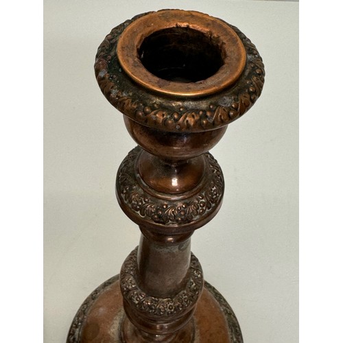 181 - A pair of cast copper candle stands, 25 cm tall.

This lot is available for in-house shipping