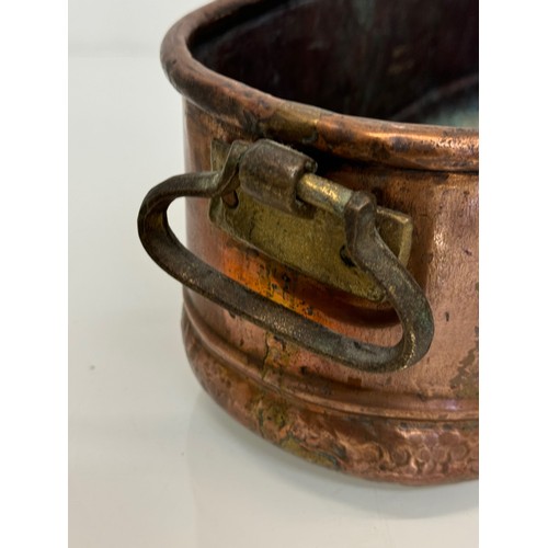 182 - A copper planter with cast brass handles, 40 cm x 17 cm x 14cm high.

This lot is available for in-h... 