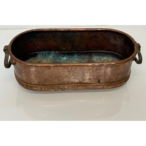 182 - A copper planter with cast brass handles, 40 cm x 17 cm x 14cm high.

This lot is available for in-h... 