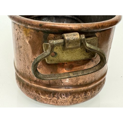 182 - A copper planter with cast brass handles, 40 cm x 17 cm x 14cm high.

This lot is available for in-h... 