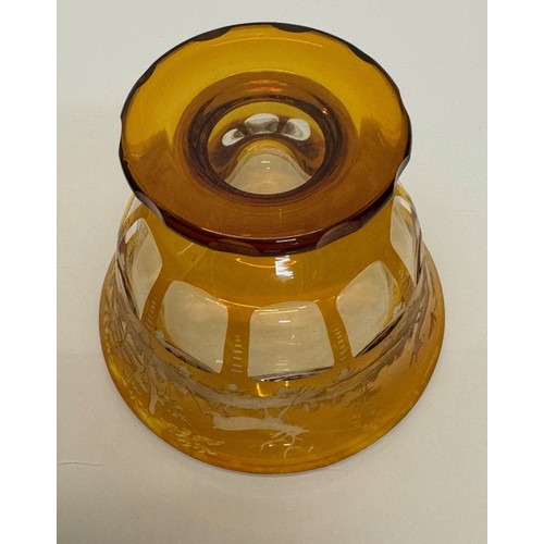 193 - Wheel cut amber glass bowl decorated with deer in a woodland setting, 13 cm diameter x 10.5 cm high.... 