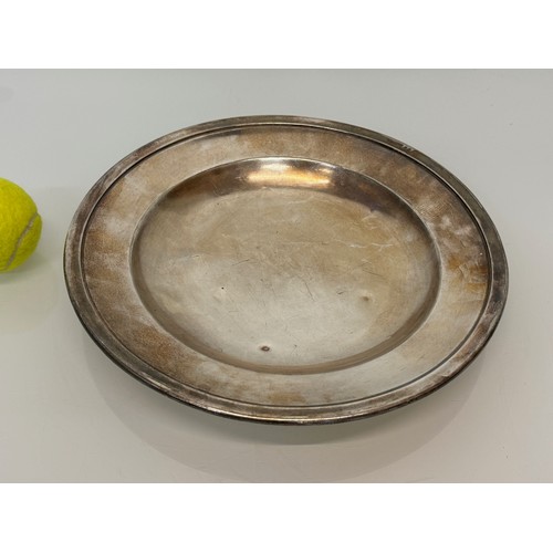 194 - White metal platter, engraved with a name and with continental marks, 30 cm in diameter.

This lot i... 