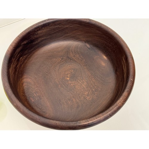 196 - A turned wooden bowl from African hard wood, 34 cm x 10 cm high.

This lot is available for in-house... 