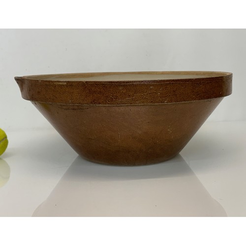 197 - Kitchenalia, a glazed stoneware mixing bowl, 40 cm in diameter x 17 cm high.

This lot is available ... 