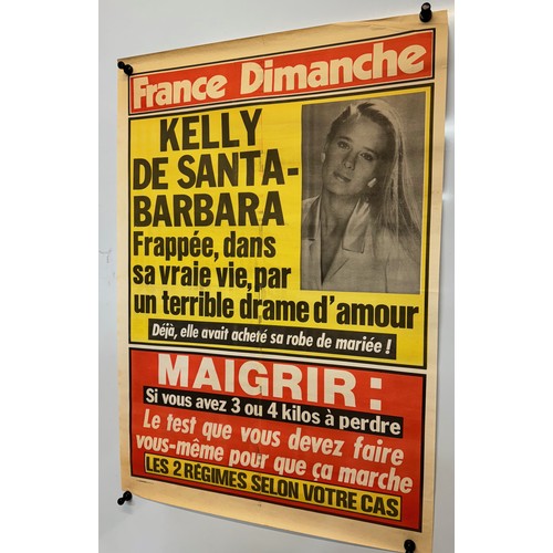 201 - A Newspaper advertising poster featuring Kelly from the soap Santa Barbra, 76 cm x 58 cm.

This lot ... 