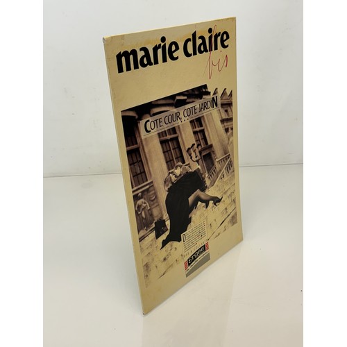 205 - Shop display an advertising sign for the journal Marie Claire bis, 40 cm x 26 cm.

This lot is avail... 