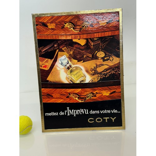 206 - An embossed advertising display sign for Coty perfume, 41.5 cm x 30 cm.

This lot is available for i... 