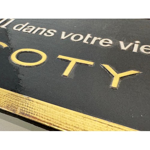 206 - An embossed advertising display sign for Coty perfume, 41.5 cm x 30 cm.

This lot is available for i... 