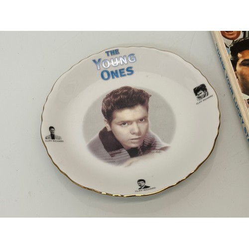 215 - Pop music memorabilia, Thank Your Lucky Stars annual and a Cliff Richard plate.

This lot is availab... 