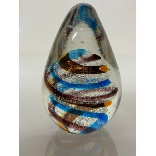 216 - Three decorative glass paperweights. 13 cm 7 cm and 6 cm high.

This lot is available for in-house s... 