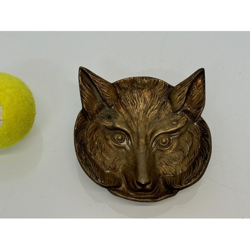 272 - Cast brass tray in the form of a foxes head, 13 cm x 12 cm.

This lot is available for in-house ship... 