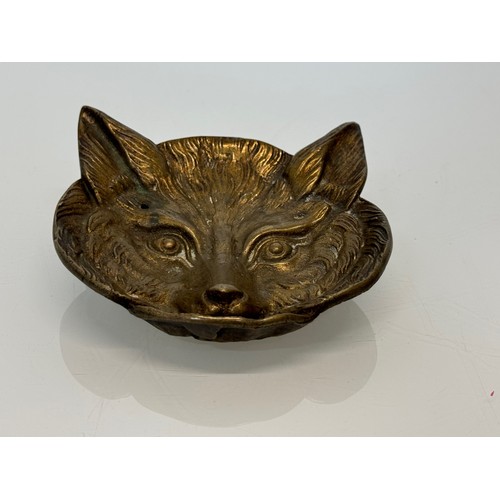 272 - Cast brass tray in the form of a foxes head, 13 cm x 12 cm.

This lot is available for in-house ship... 