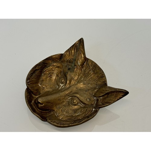 272 - Cast brass tray in the form of a foxes head, 13 cm x 12 cm.

This lot is available for in-house ship... 