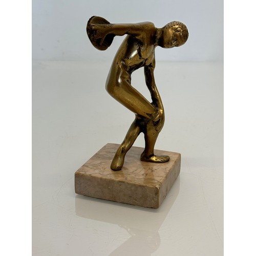 273 - Cast figure of a discus thrower on a marble base, 14 cm high.

This lot is available for in-house sh... 