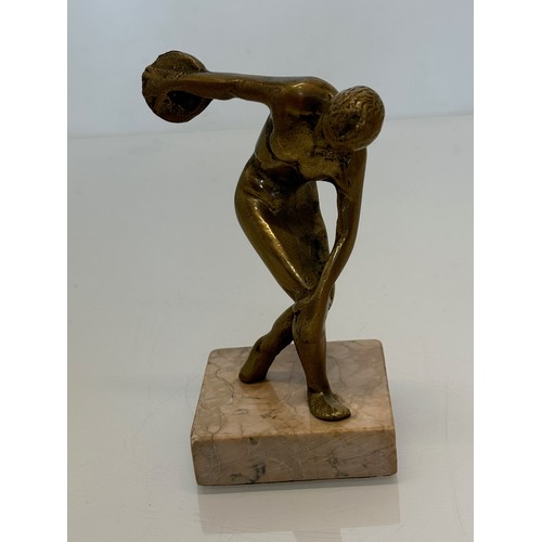 273 - Cast figure of a discus thrower on a marble base, 14 cm high.

This lot is available for in-house sh... 