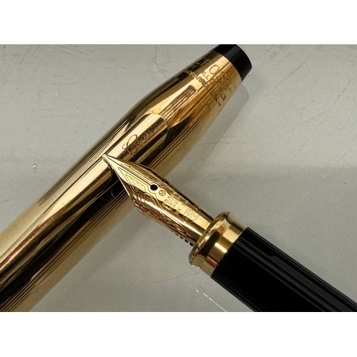 274 - Writing instruments, a rolled gold Cross fountain pen with 18ct nib, boxed.

This lot is available f... 