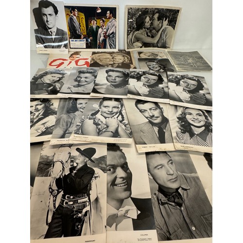 278 - A collection of cinema related ephemera, press photographs lobby card and programmes.

This lot is a... 