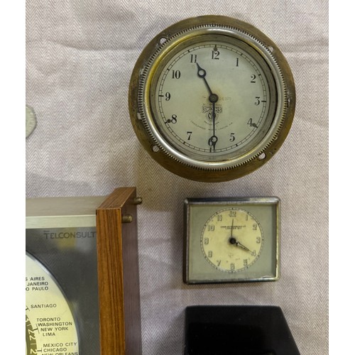 308 - A Selection of Vintage Clocks including a Smith's Dashboard Clock and a Lord Hill Telconsult. 

This... 