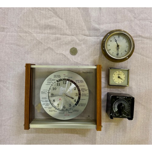 308 - A Selection of Vintage Clocks including a Smith's Dashboard Clock and a Lord Hill Telconsult. 

This... 