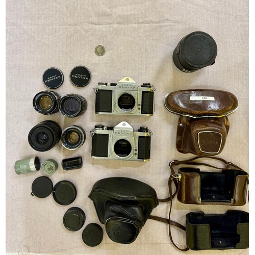 309 - A Collection of 1960s Pentax 35mm SLR Camera Equipment. Includes 2 Pentax SV 35mm Cameras with Cases... 