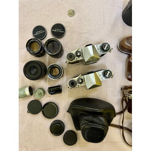 309 - A Collection of 1960s Pentax 35mm SLR Camera Equipment. Includes 2 Pentax SV 35mm Cameras with Cases... 