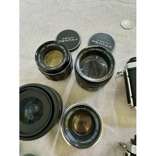 309 - A Collection of 1960s Pentax 35mm SLR Camera Equipment. Includes 2 Pentax SV 35mm Cameras with Cases... 