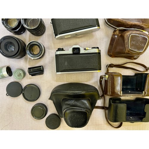 309 - A Collection of 1960s Pentax 35mm SLR Camera Equipment. Includes 2 Pentax SV 35mm Cameras with Cases... 